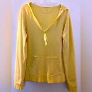 Calvin Klein yellow hoodie, size Large.  V-neck with a satin ribbon tie.